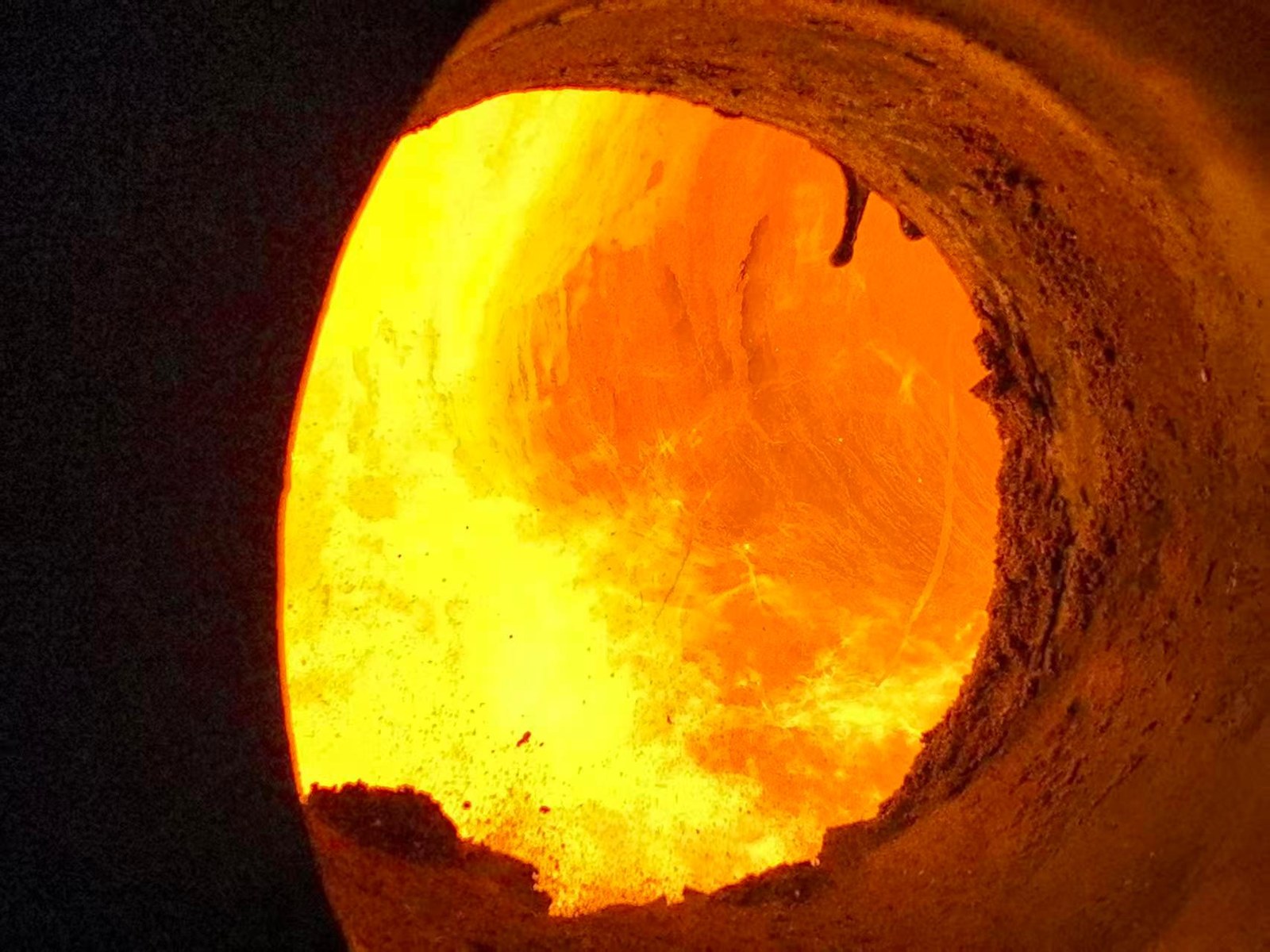 Glowing interior of a high-temperature incineration kiln